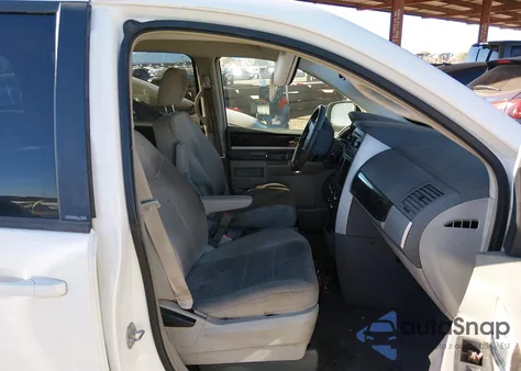 2010 Dodge Grand Caravan Sxt z USA, uszkodzony, nr VIN 2D4RN5D18AR144270